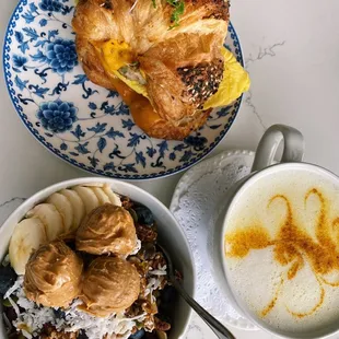 Turkey sausage, egg &amp; cheese on an everything croissant, açaí bowl with natural peanut butter, &amp; a golden turmeric latte