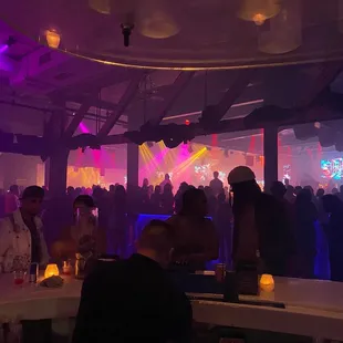 a crowd of people at a nightclub