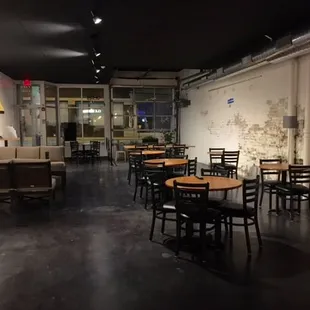 Our front seating area - with the 10-seat U-Lounge and tables... the garage door in front will be open on warm summer nights!