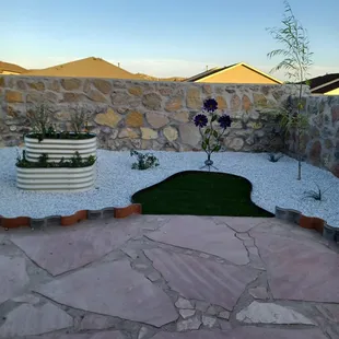 Left a spot for us to put in a bit of green for our dog.