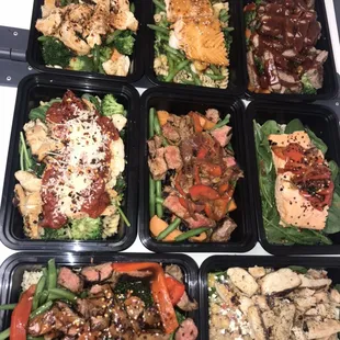 Salmon, steak, and chicken meals.