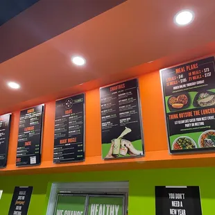 menus on the wall of the restaurant
