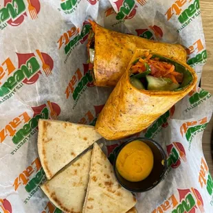 Bang bang shrimp with side of pita and hummus