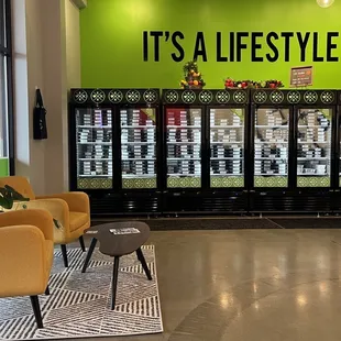 a green wall with a sign that says it's a lifestyle