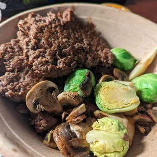 Bison bowl with mushrooms brussel sprouts and potatoes