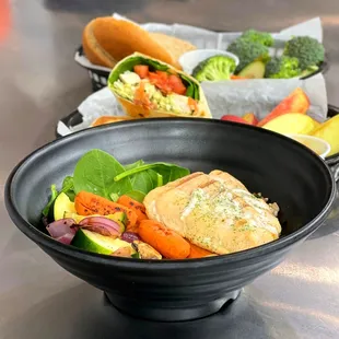 a bowl of vegetables and chicken