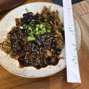 Korean short rib and Caesar salad with grilled salmon