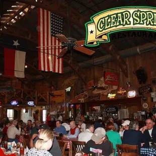 a large group of people sitting at tables