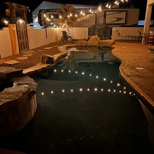 Night lighting in back yard (court yard) complete construction. From walls, to gates, to pools and landscaping. We do it all.