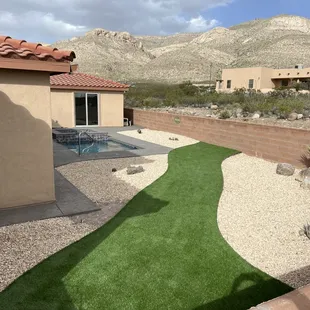 Customer wanted a grass strip for family fun time, playing corn hole. Our design/ build turned out great.