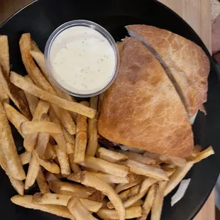 a plate of fries and a sandwich