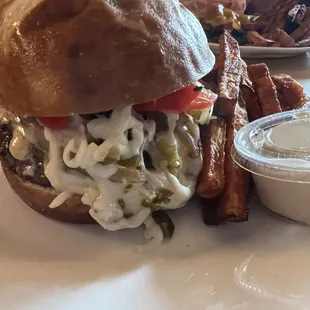 a burger and fries on a plate