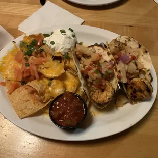 Shrimp tacos with chips and cheese for the side. Very good