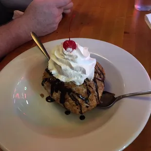 Huge deep fried ice cream w coconut, almonds and cornflakes. Should be called Almond joy fried ice cream.