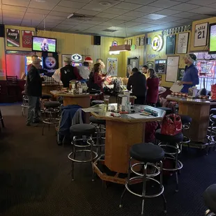 people sitting at the bar