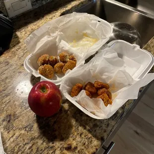 There&apos;s an apple for comparison. Those wings and 3 bud lights. $35.
