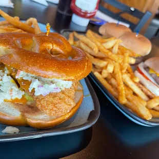 Tangy Carolina Chicken on a pretzel bun and 3 Cheeseburger Sliders with fries