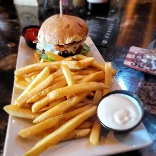 a plate of fries and a burger