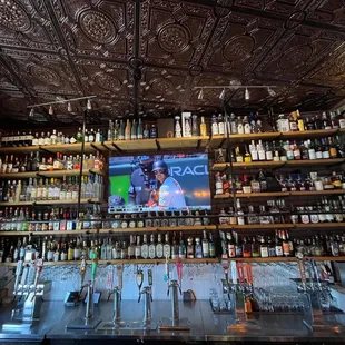 a bar with lots of bottles