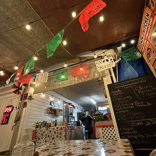 a mexican restaurant decorated for the day of the dead