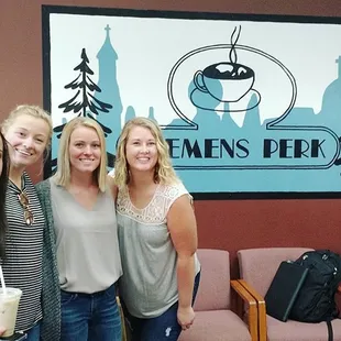 three women posing for a picture