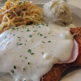 Wednesday Bleu&apos;s $10  Cordon blue topped with Parmesan sauce side of mash and chipotle pasta   Sauce is sooo super good!