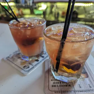 two cocktails on a table
