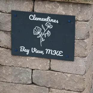 a sign for clementines bay view mke