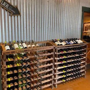 a wine rack with many bottles of wine