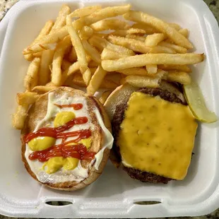 Cheeseburger with fries for takeout. (Aug 2024)