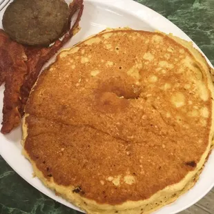 a plate of pancakes and bacon
