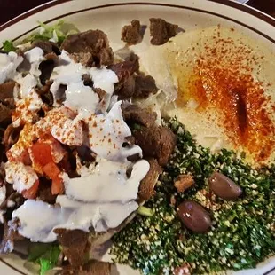 Al Maryam Plate, served eith hummus and tabbouleh salad