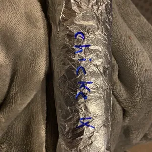 a stuffed elephant wrapped in aluminum foil