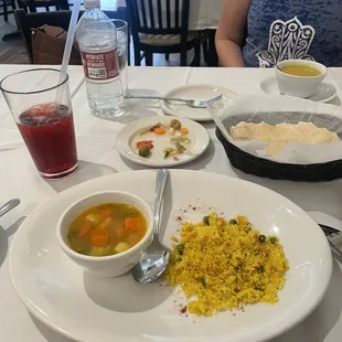 Couscous w Small Vegetable Soup (foreground), Small Lentil Bean Soup (background)