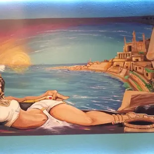 a painting of a woman on a beach