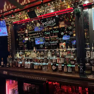 a bar with christmas lights