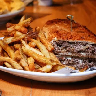 a hamburger and fries on a plate