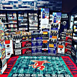 a display of beer in a liquor store