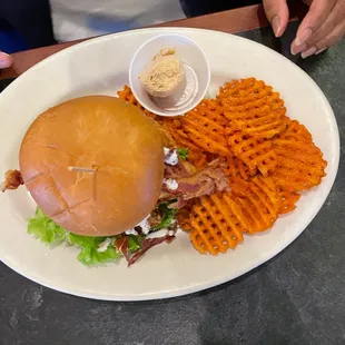 Chicken sandwich with sweet potato fries