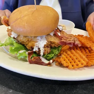 Chicken bacon ranch sandwich with sweet potato fries