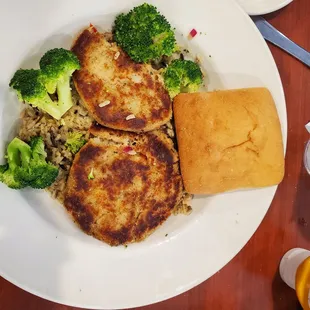 Salmon cakes with wild rice.  Pic was taken late so part of broccoli and salmon cake are missing LOL!