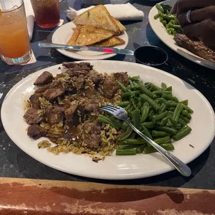 Beef rib tips with wild rice and and string beans