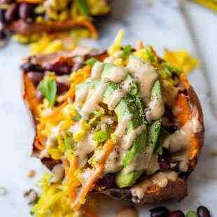 a close up of a loaded loaded sweet potato