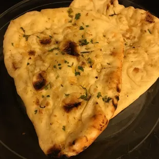 two flatbreads on a plate