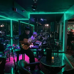 a man playing a guitar