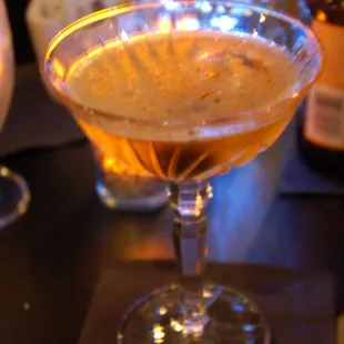 a cocktail in a coupe glass