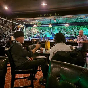 people sitting at a bar