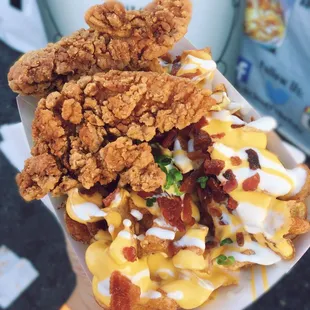 Loaded Baked Potato Twisted Fries w/ a Chicken Fingers to top it off!