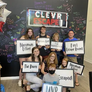 Our photo after we escaped with provided props! We even got to sign the wall after :)