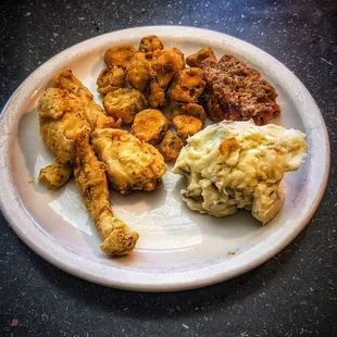 Frog legs, mashed potatoes, fried okra, and meatloaf. The perfect buffet!
